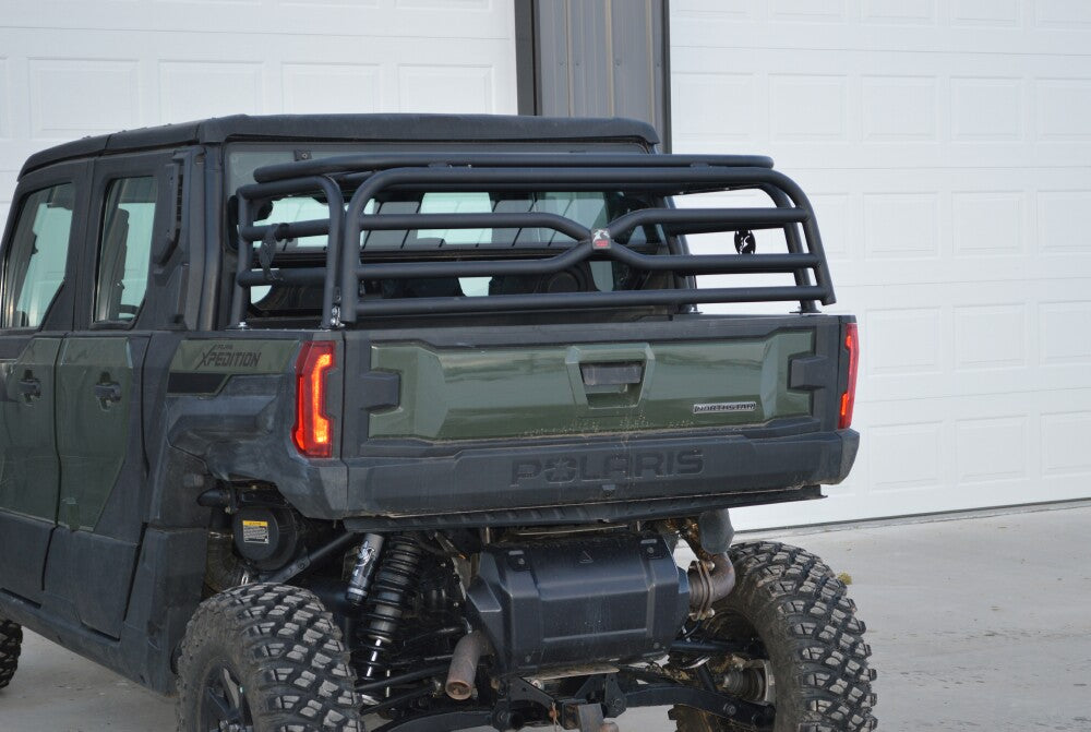 Polaris Xpedition cargo rack basket with tie-down holes along the rail