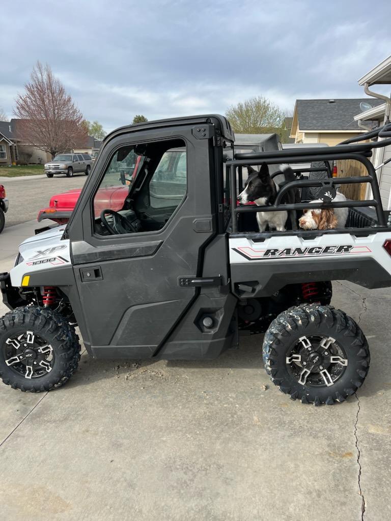 Cargo rack hard mounted to the Polaris Ranger bed with no drilling